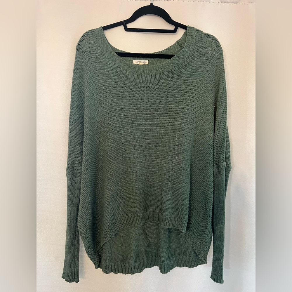 Comfy light weight sweater. Fits sizes small and medium